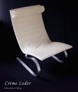 Swinging leather chair with pleasent neck roll - Creme or black.