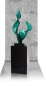 Preview: Green sculpture on marble column abstract