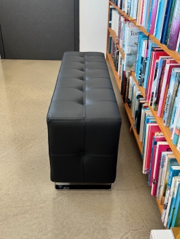 Small black leather bench