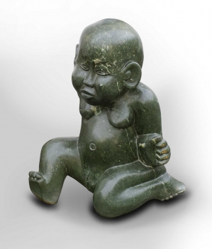 Stone sculpture angry baby