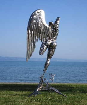 Iron angel with wing garden sculpture