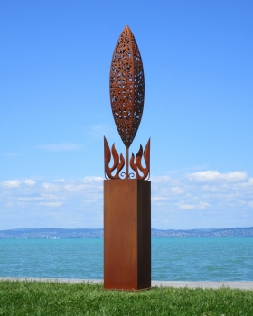 Big stainless steel artwork on rusty column