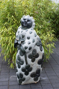 Stone garden sculpture fat lady Rosemary