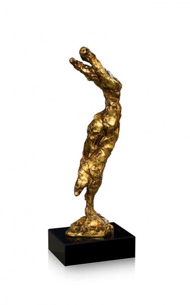 Sculpture abstract dancer in gold