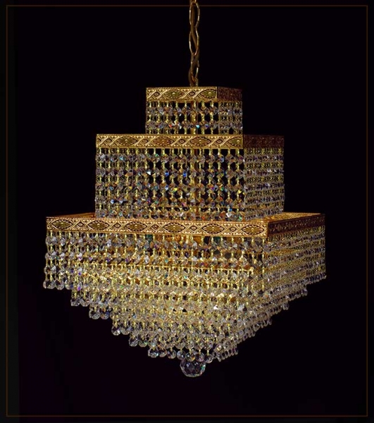 Oriental cube gold chandelier with ornamentation and 4 illuminates.