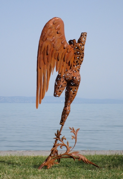 big angel garden sculpture rusty