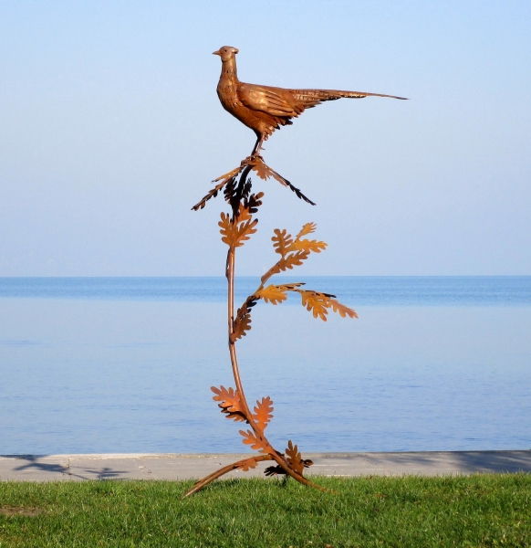 Pheasant on branch sculpture
