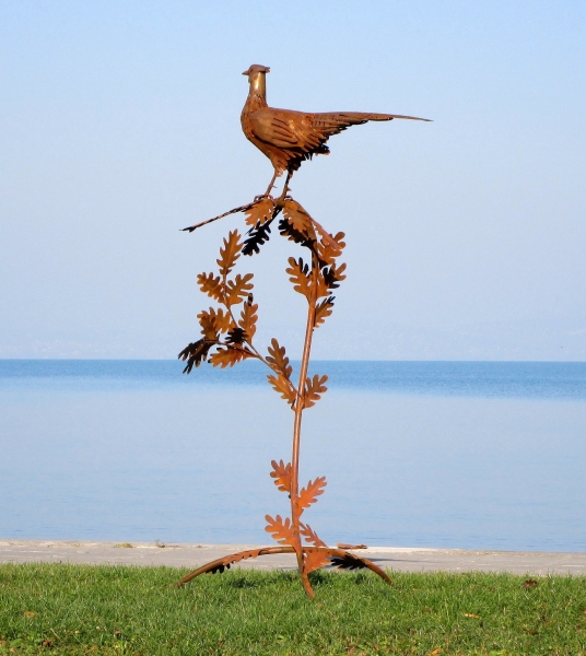 Garden artwork pheasant on branch