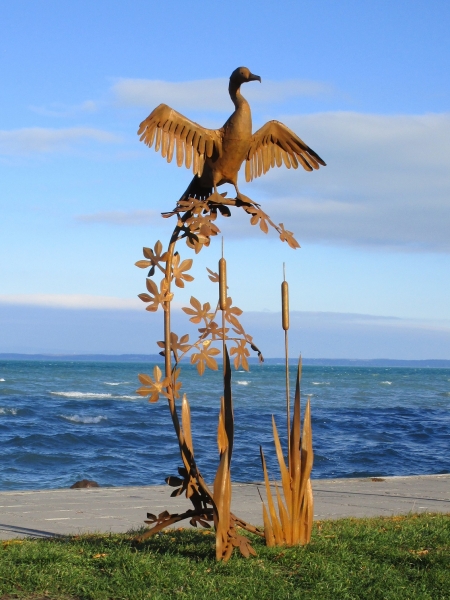 Cormorant garden sculpture rusty