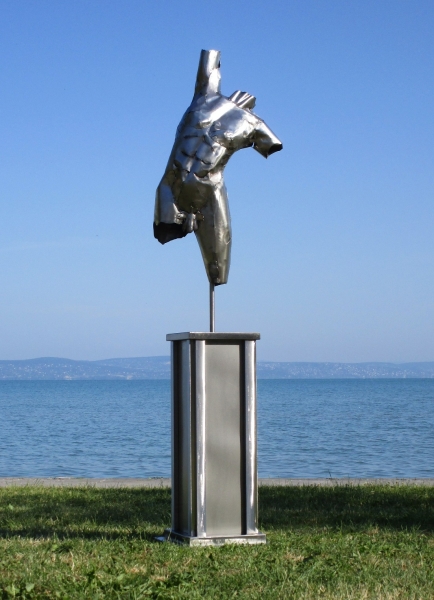 Torso male on column