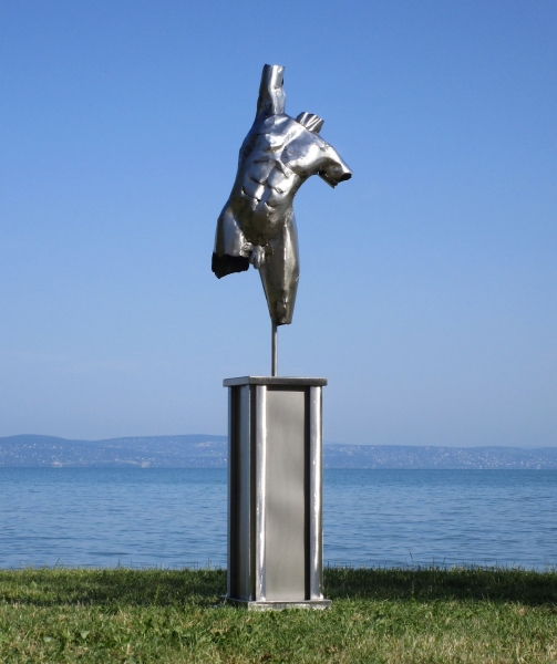 Nude men sculpture on column