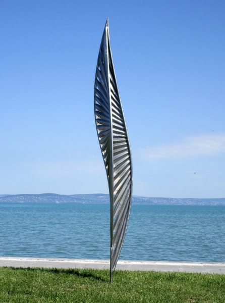 Thin stainless steel garden sculpture