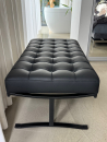 Black leather black legs bench